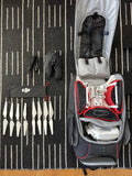DJI Phantom 3 4K drone in open Manfrotto backpack case with accessories pouch