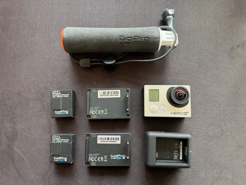GoPro HERO 3+ Plus Silver Edition action camera with accessories and protective case