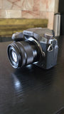 Panasonic Lumix G7 Mirrorless Camera with 35-100mm Lens (Black) *Needs SD Card*