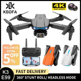Gray quadcopter drone with four propellers and front camera module