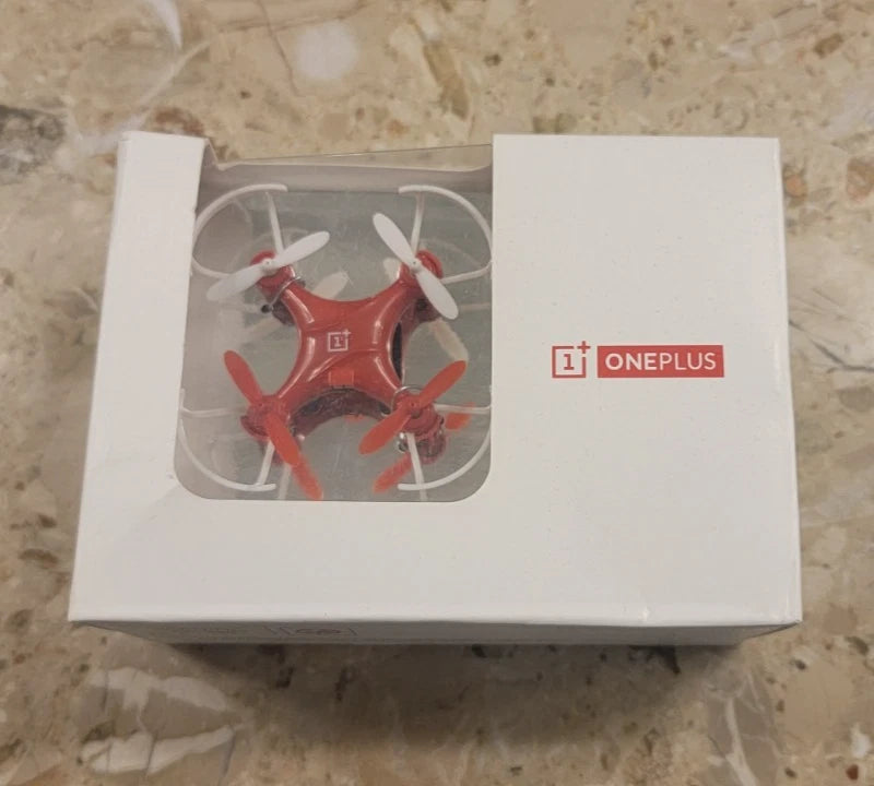 ONEPLUS 4-channel mini R/C drone in box, red quadcopter