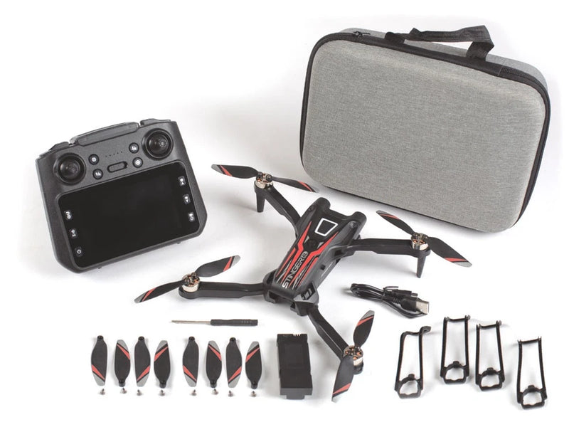 FPV drone kit with gray storage case, controller, and quadcopter