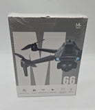 Foldable remote-control drone with four propellers and handheld controller, dark