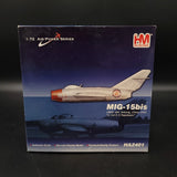 Die-cast aircraft model box showing a gray MIG-15bis jet and HA2401 label