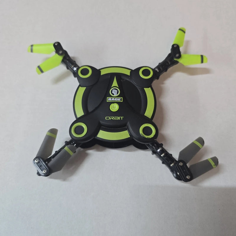 Green and black quadcopter drone with four propellers, no controller included