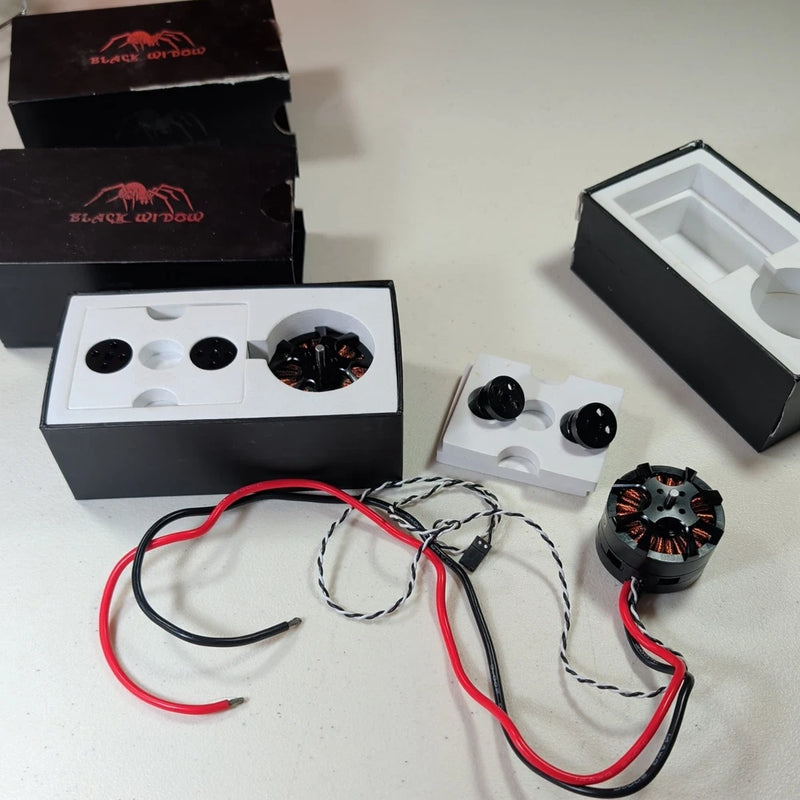 RC brushless motor kit with red/black wires, two motors, and packaging box
