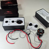 RC brushless motor kit with red/black wires, two motors, and packaging box
