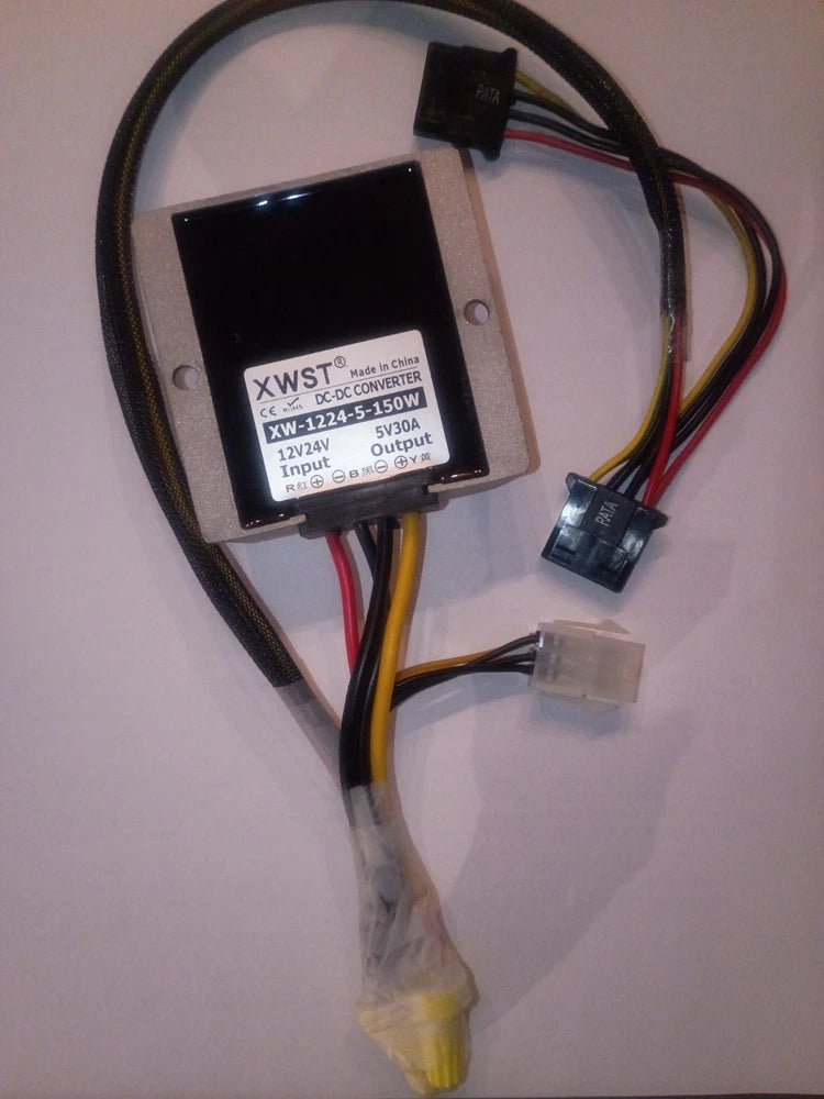 Black DC-DC converter module with attached multi-wire harness and labeled pins
