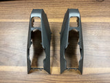 Aircraft front shell module halves, dark gray plastic, with cutouts and mounting tabs
