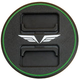 Black round lens cap with green edge ring and dual protective openings