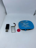 Blue wireless motion hand controller with red button and USB charging parts