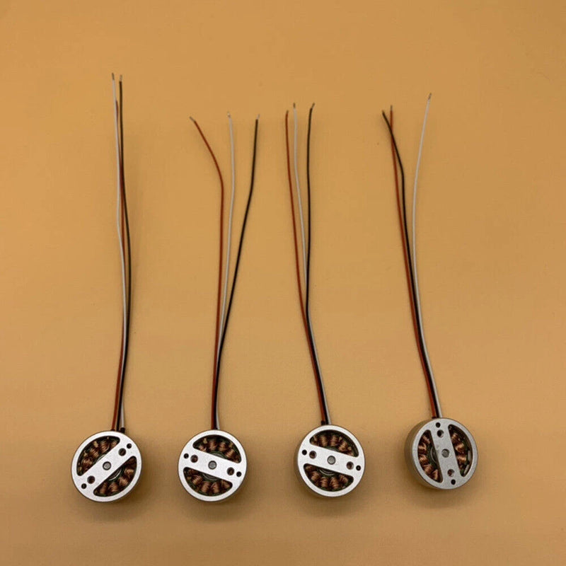 Drone arm motor replacement set with four circular motors and long wire leads