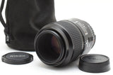 Nikon AF Micro 105mm macro lens with front and rear caps, in pouch