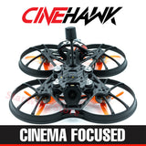 Black FPV cinewhoop drone with central camera and four orange prop guards