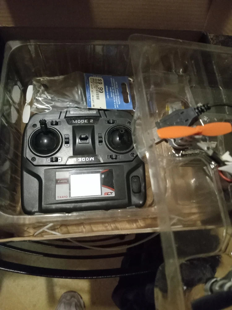 Heli-Max ready-to-fly quadcopter controller with dual joysticks and screen in box