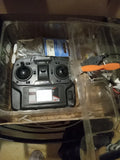 Heli-Max ready-to-fly quadcopter controller with dual joysticks and screen in box