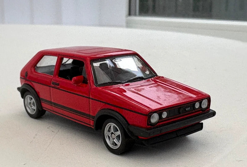 Playpop Volkswagen Golf I GTI model toy car, red hatchback with black grille