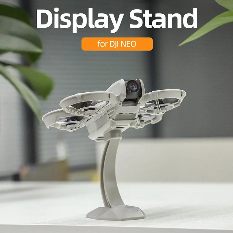 White desktop drone display stand for DJI NEO, curved bracket with platform