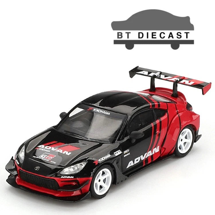 1/64 scale die-cast sports car, red and black with rear wing and white wheels