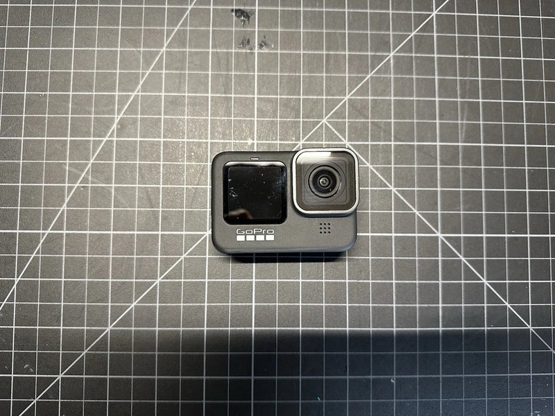 GoPro Hero 9 Black action camera with front lens and small status lights