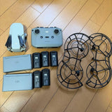 Dji Mini 2 drone kit with controller, batteries, cases and propeller guards
