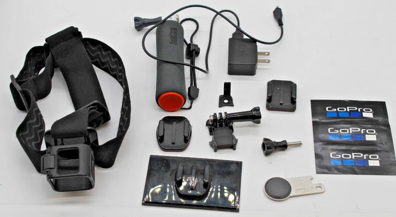 GoPro HERO5 accessory kit with head strap, mounts, charger, and protective case