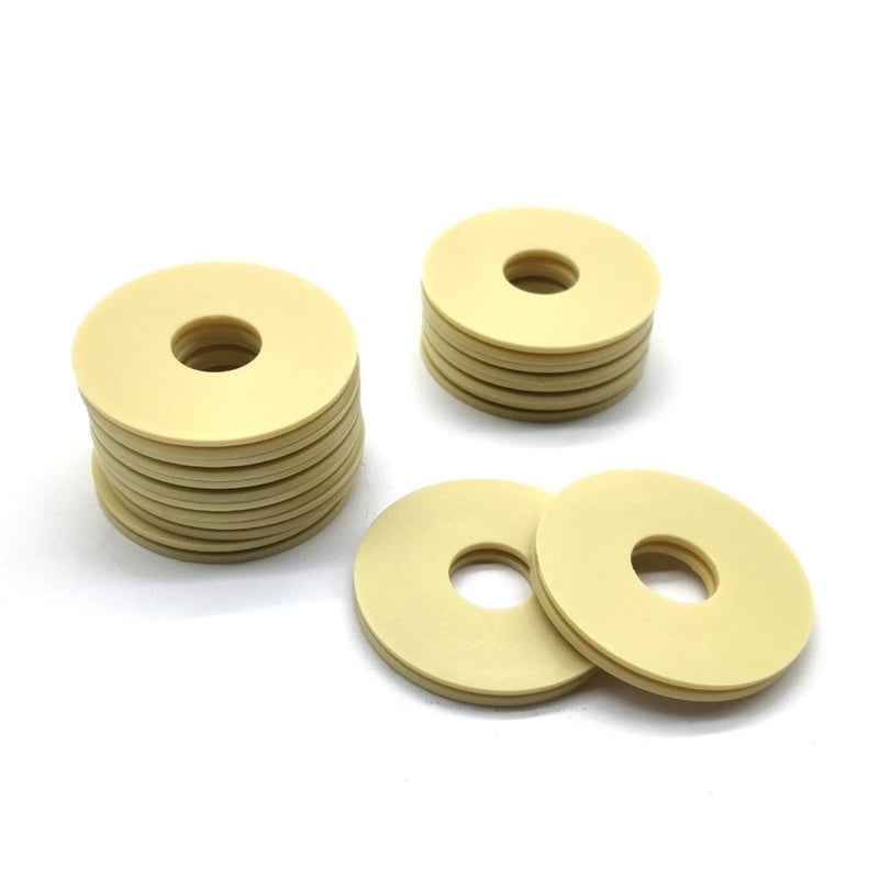 Rubber propeller gasket set with central holes, stacked and loose
