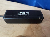 LTIBLOX laptop interface adapter, black rectangular box with LTIBLOX label