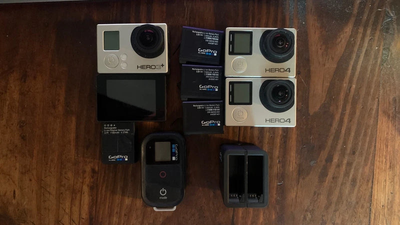 GoPro HERO4 and HERO3+ action camera set with remote and mounting accessories