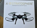 Black quadcopter drone with Wi‑Fi camera, front view