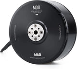 MAD M30 brushless drone motor, black circular body with mounting plate and wire
