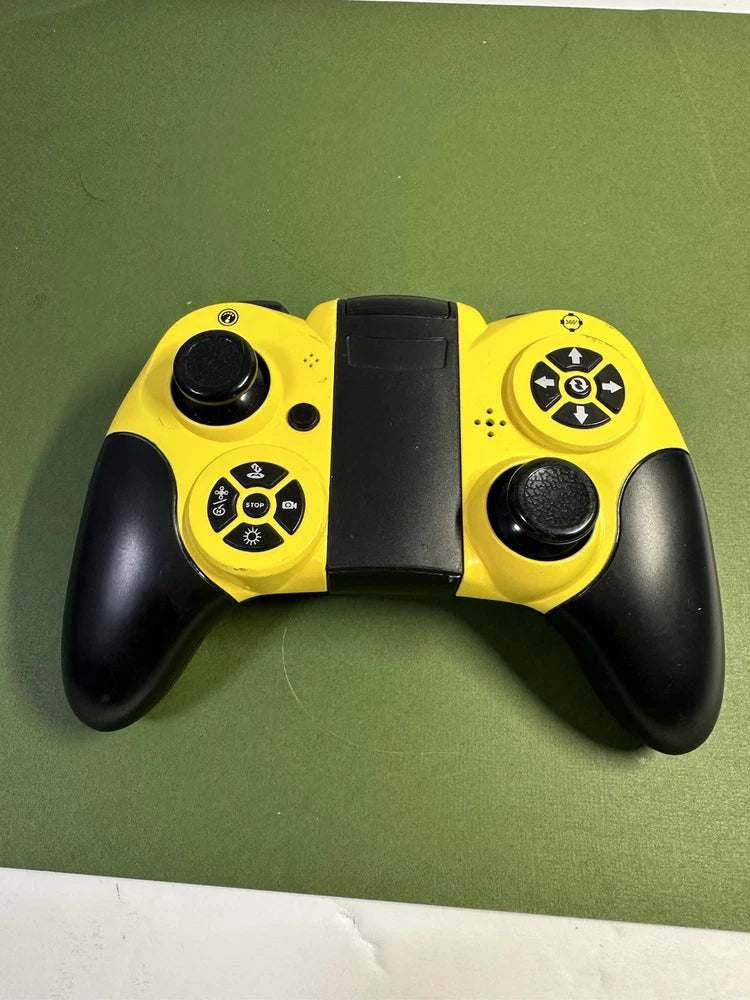 Yellow and black FPV drone remote controller with thumbsticks and buttons