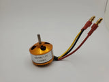 Gold A2208 brushless outrunner motor with 1100KV label and red/black wire leads