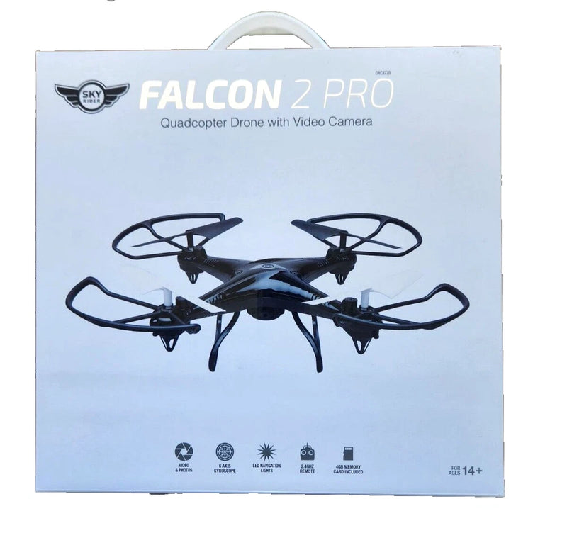 Black quadcopter drone with video camera, four rotors, shown on retail box