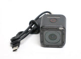 GoPro Hero 5 Session action camera with front lens and attached power cable