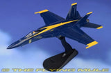 1:72 F/A-18E Super Hornet model jet on display stand, blue with yellow accents