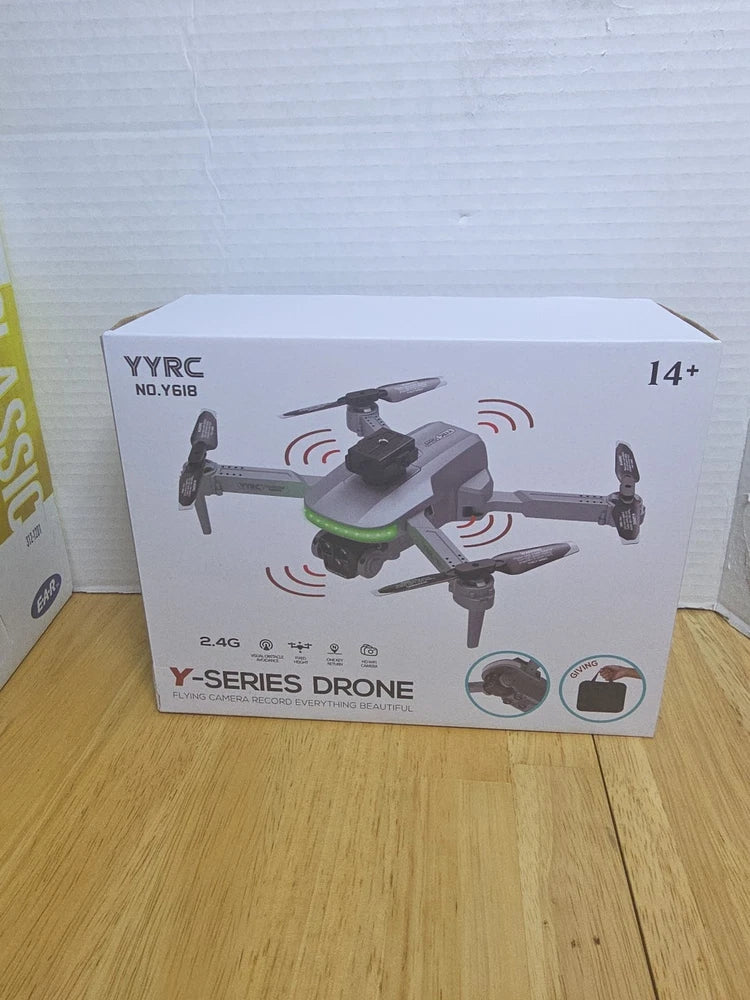 YYRC Y618 quadcopter drone retail box with WiFi camera and obstacle icons