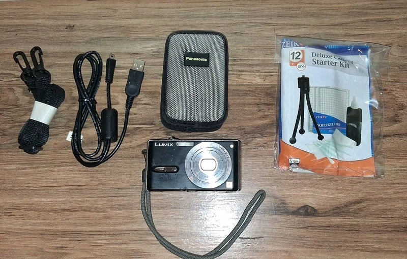 Black Panasonic LUMIX digital camera with textured case and wrist strap
