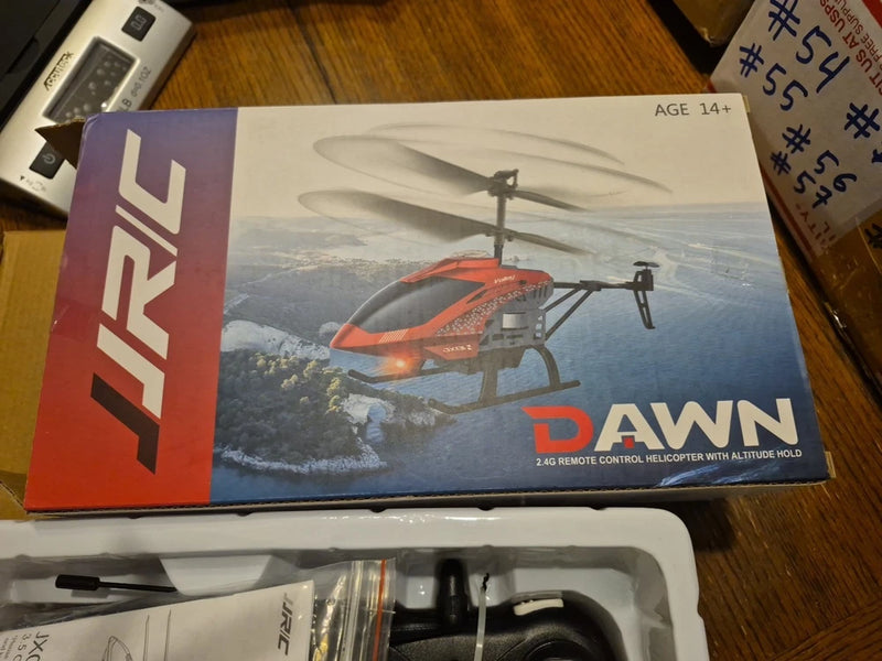 Remote control helicopter retail box with illustrated orange helicopter and altitude hold