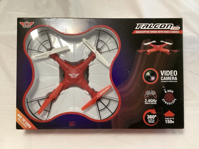 Quadcopter drone with video camera, red and gray, shown in retail box