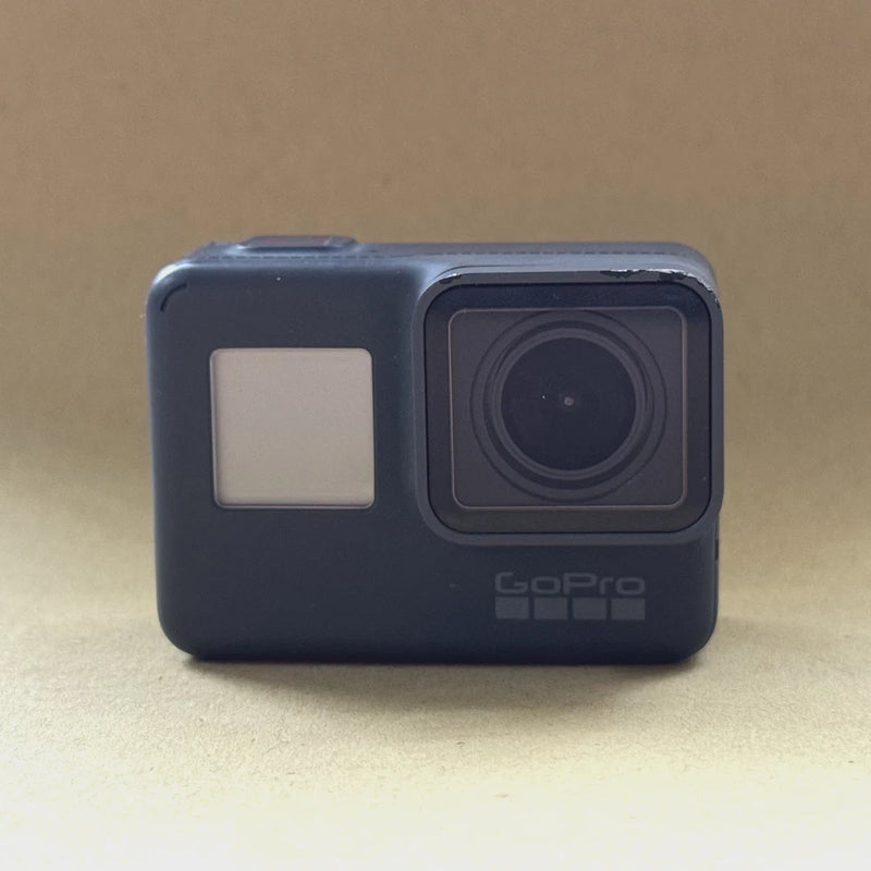 GoPro HERO5 Black action camera front view with lens and status screen