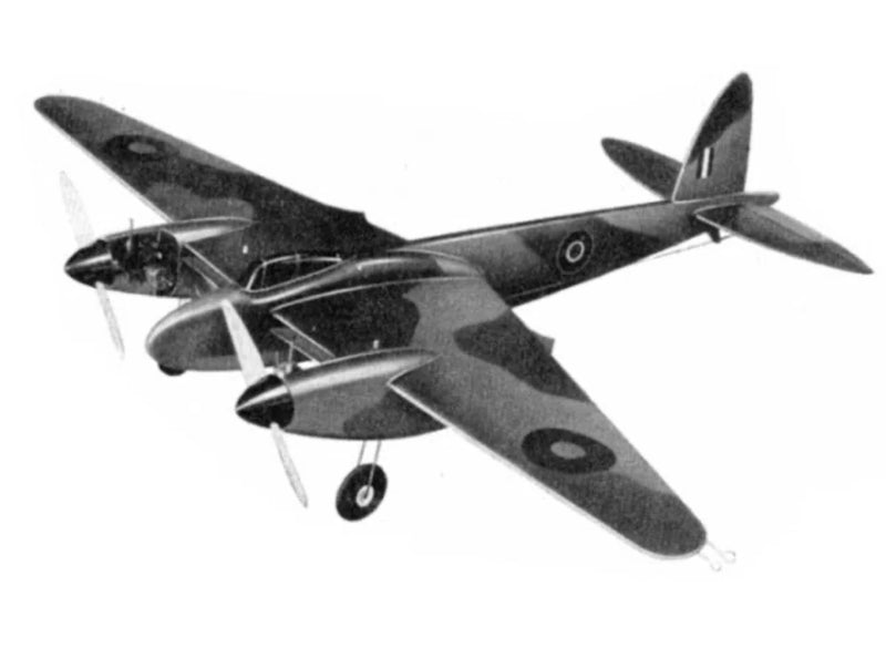 Dark gray RC airplane model with propeller, wings, and tail fins