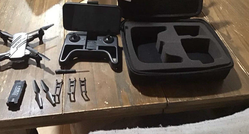 Kids mini drone kit with 720P FPV in open carrying case, propellers and parts