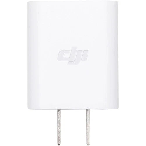 DJI wall charger adapter with white body and two metal prongs