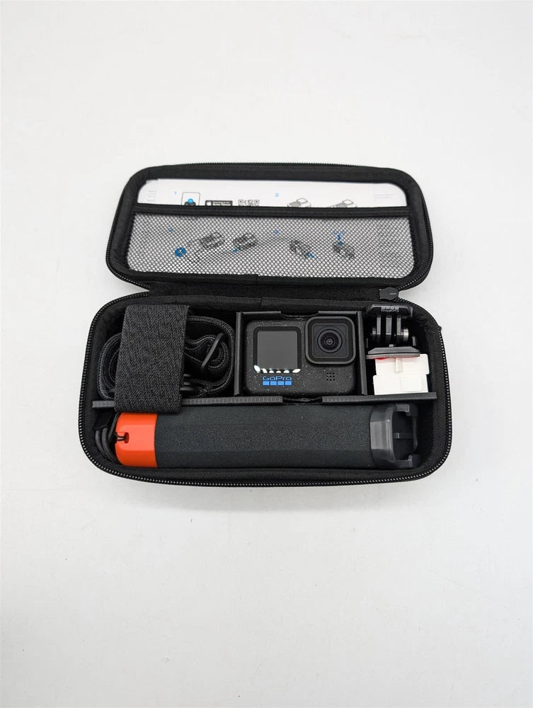 Black zippered action camera accessory case with mounted camera and orange grip piece