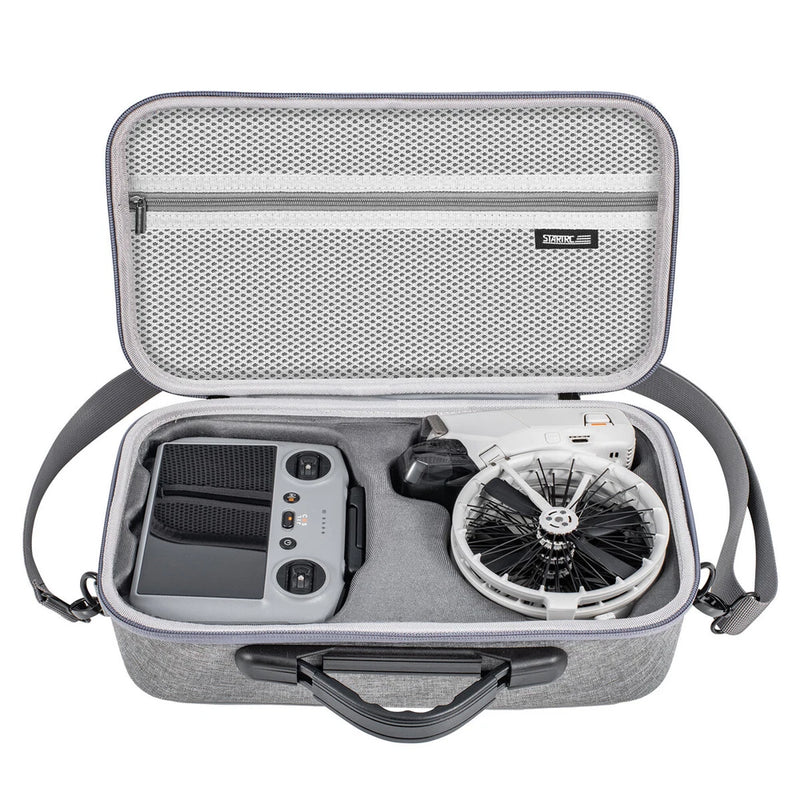 Gray padded hard-shell storage case with zipper, molded compartments, and elastic straps