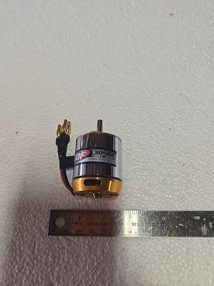 Brushless RC motor, cylindrical can with label and gold/black leads