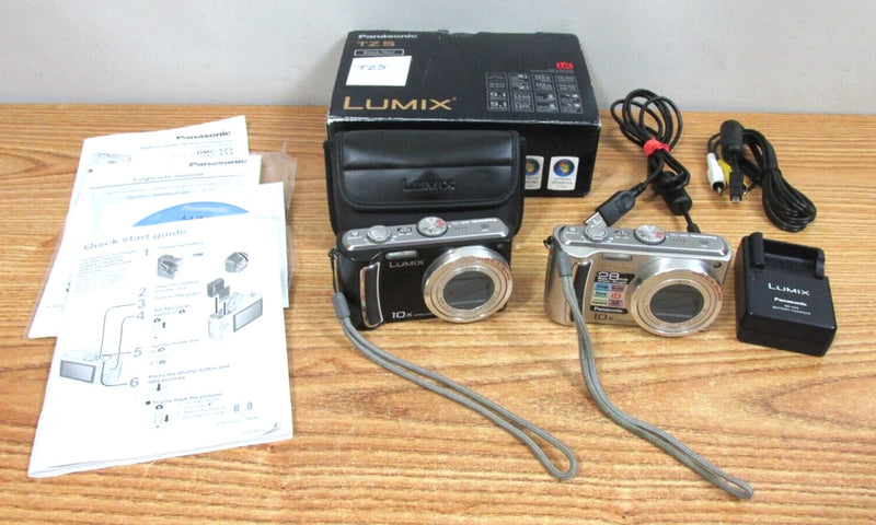 DMC-TZ5 PANASONIC LUMIX CAMERAS BLACK & SILVER AS IS FOR PARTS OR NOT WORKING