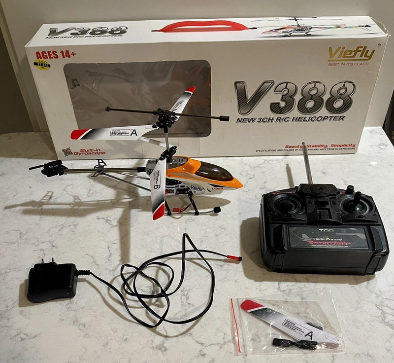 VIEFLY V388 3-channel RC helicopter drone with orange rotor and black remote controller