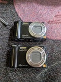 Lot of 2 Panasonic Lumix DMC-ZS1 DMC-ZS7 Digital Cameras Parts/Repair Only